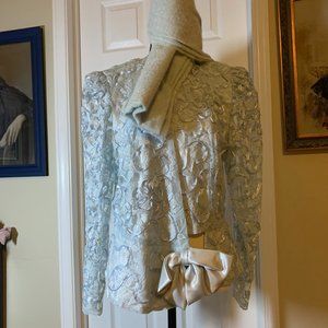 Jacket, elegant pale blue women, size L, with bow and frills. Must see